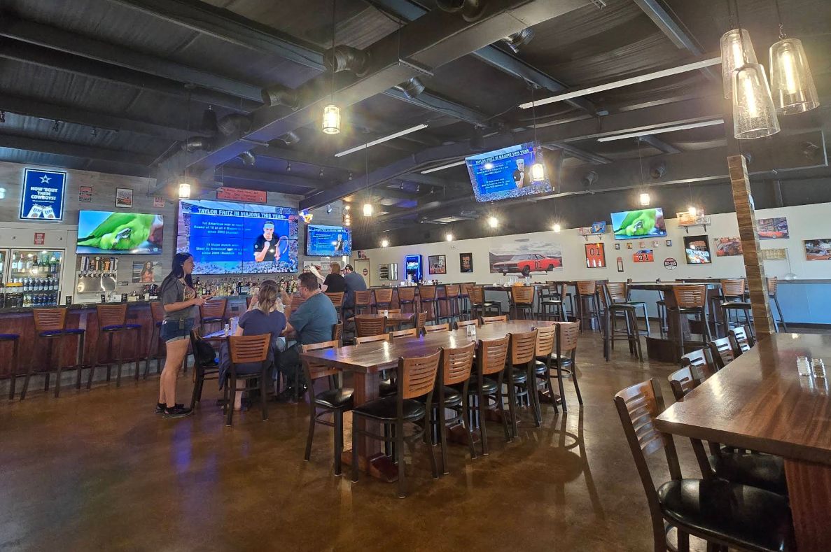 Boar's Nest dining room and bar with big screens